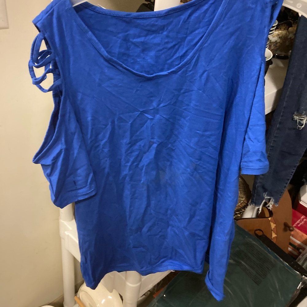 Woman’s blue top
